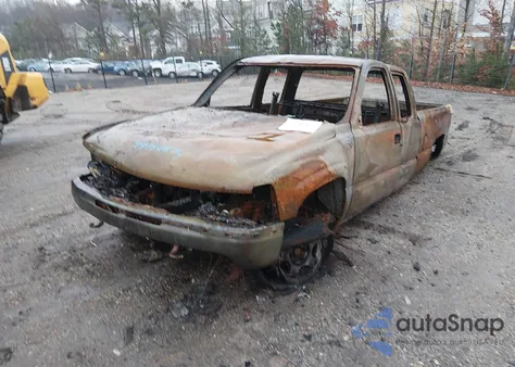 2000 Chevrolet Silverado 1500 Ls z USA, uszkodzony, nr VIN 1GCEK19T6YE214363